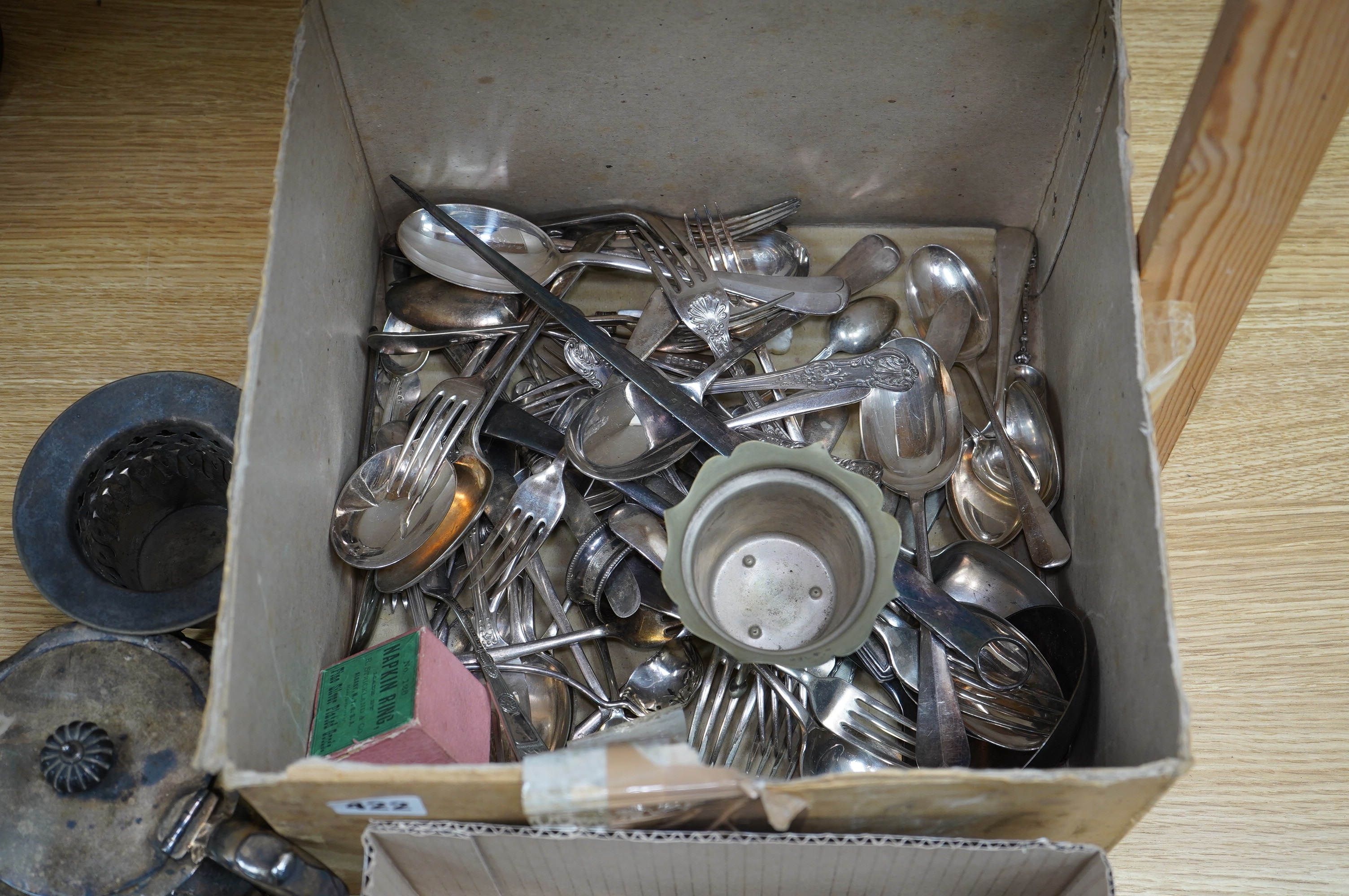 A small quantity of silver flatware, assorted plated cutlery, napkin rings and servers. Condition - varies, mostly fair
